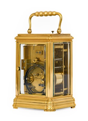 Lot 698 - A Brass Strike and Repeat Carriage Clock,...