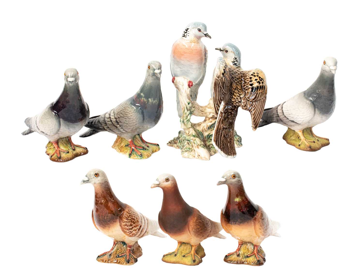 Lot 1148 - Beswick Pigeons Comprising