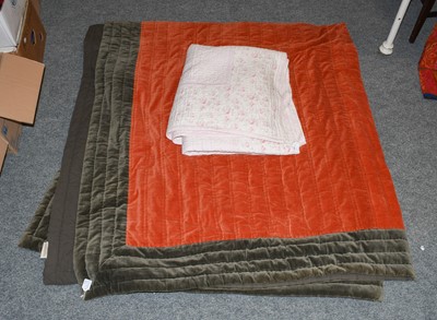 Lot 1147 - Late 19th century pale pink quilt edged with...