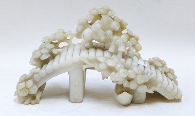 Lot 320 - A Chinese white soapstone carving of a bridge...