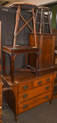 Lot 1299 - Early 20th century oak three height stacking...