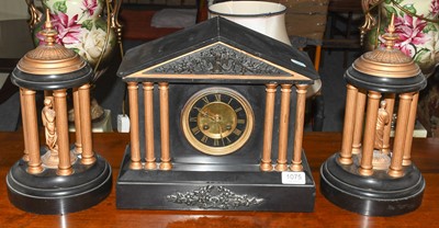 Lot 1075 - A Victorian black slate striking mantel clock...