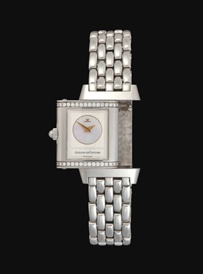 Lot 2185 - Jaeger LeCoultre: A Lady's Stainless Steel Diamond Set Reverso Wristwatch