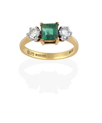 Lot 2366 - An 18 Carat Gold Emerald and Diamond Three Stone Ring