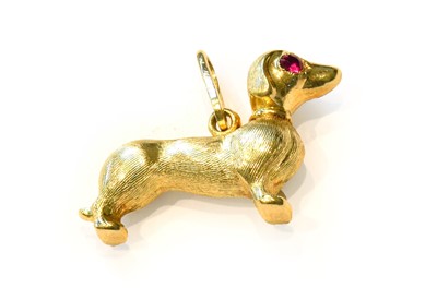 Lot 200 - A dachshund pendant/charm, with synthetic ruby...