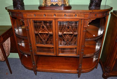 Lot 464 - Late 19th century walnut credenza with carved detailing and astragal glazed doors