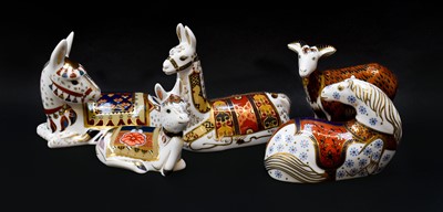 Lot 19 - Royal Crown Derby Imari paperweights; Thistle...