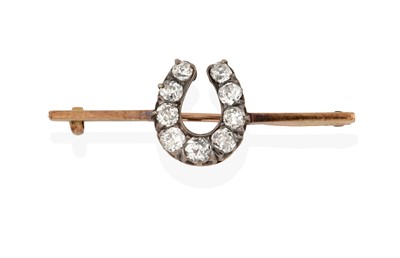 Lot 2290 - A Diamond Horseshoe Bar Brooch