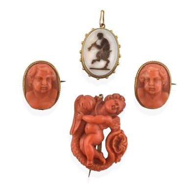 Lot 2339 - Three Coral Cameo Brooches and a Hardstone Cameo Pendant