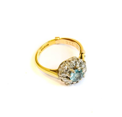 Lot 207 - A blue zircon and diamond cluster ring, finger...