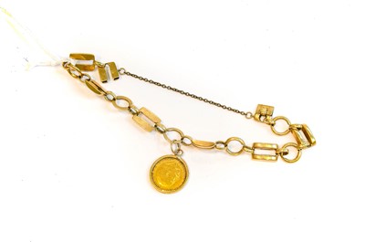 Lot 216 - A 9 carat gold fancy link bracelet, suspending...