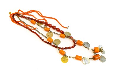 Lot 211 - A two row coral bead necklace; a coral bead...