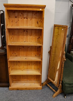 Lot 1109 - A pine open bookcase, 77cm by 25cm by 184cm,...