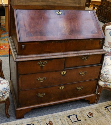 Lot 1122 - A George III walnut bureau (marriage), 98cm by...