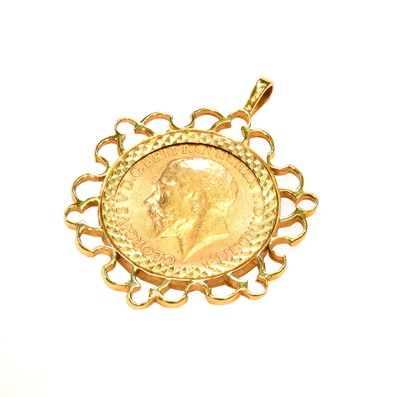 Lot 147 - A full gold sovereign dated 1912, in a 9 carat...