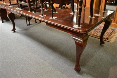 Lot 485 - Mahogany cabriole leg dining table with two leaves and winder