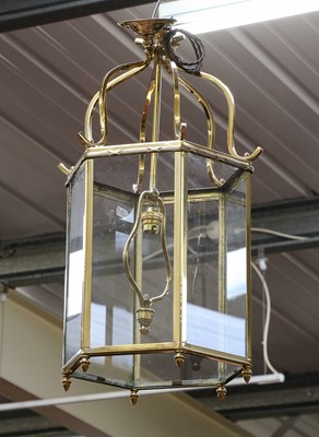 Lot 1314 - Two brass hanging lanterns of hexagonal form...