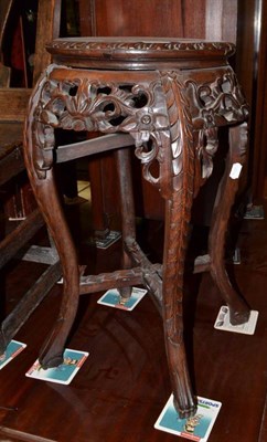 Lot 487 - Carved Chinese plant stand with marble top