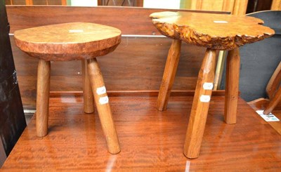 Lot 490 - Two burr elm stools, each on three oak legs