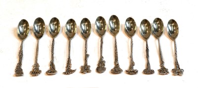 Lot 164 - A set of eleven Tiffany floral demitasse spoons