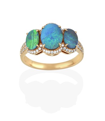 Lot 2357 - A Black Opal and Diamond Ring