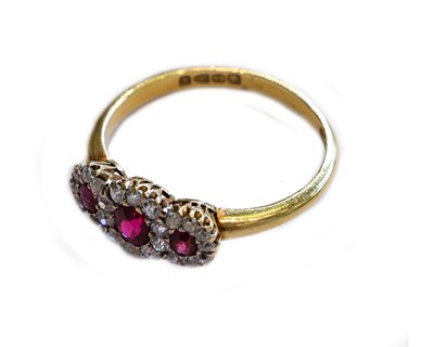 Lot 201 - An 18 carat gold synthetic ruby and diamond...