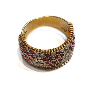 Lot 210 - A 9 carat gold ruby and white stone ring,...