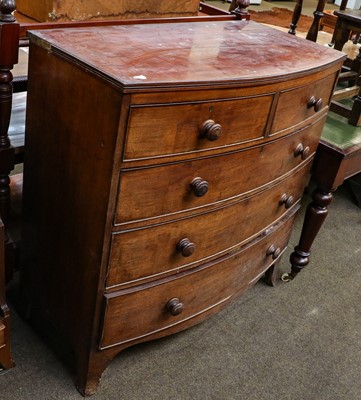 Lot 1228 - A George III mahogany bow fronted chest of...