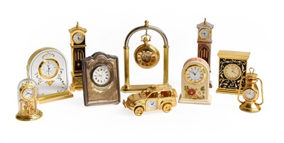 Lot 393 - Collection of miniature quartz time pieces,...