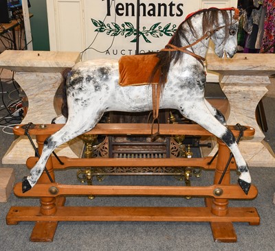 Lot 1140 - A Line Bros dapple grey rocking horse on...