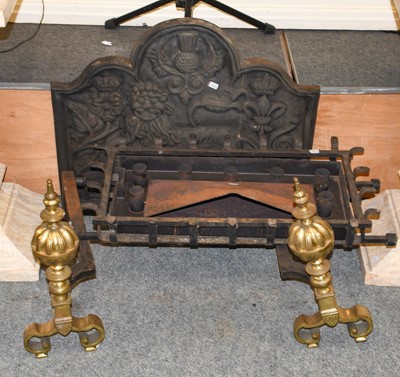 Lot 1138 - A 19th century cast iron fire back decorated...