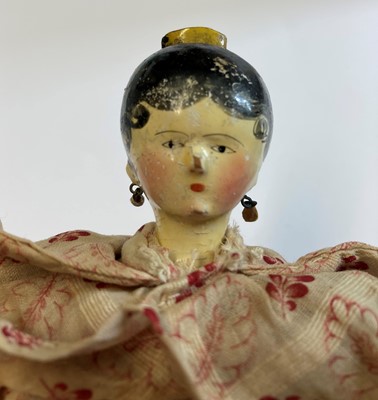 Lot 2264 - Circa 1830 Grodnertal Doll with black painted...