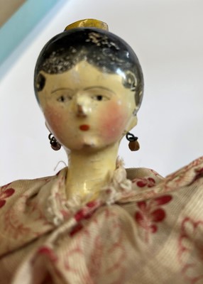 Lot 2264 - Circa 1830 Grodnertal Doll with black painted...