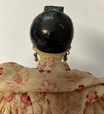 Lot 2264 - Circa 1830 Grodnertal Doll with black painted...
