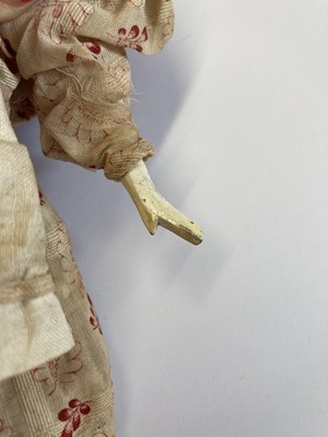 Lot 2264 - Circa 1830 Grodnertal Doll with black painted...