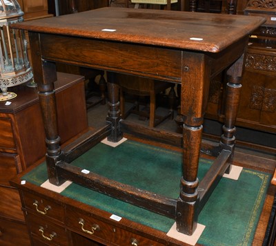 Lot 1282 - An 18th century joined oak occasional table,...