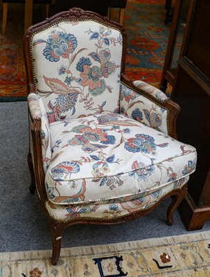 Lot 1121 - A pair of reproduction Louis XV style armchairs