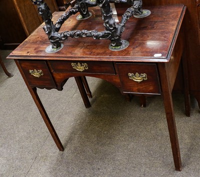 Lot 1218 - A George III mahogany dressing table, the...