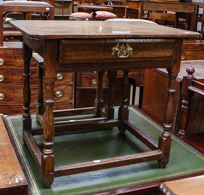 Lot 1234 - An early 18th century oak side table, the...