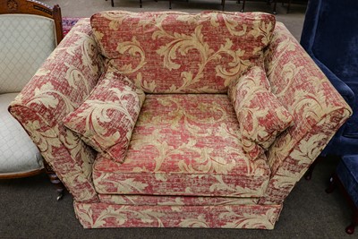 Lot 1257 - A large scroll armchair in claret and gold...