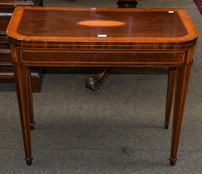 Lot 1277 - George III mahogany fold over card table,...