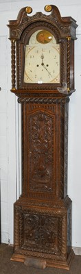 Lot 1195 - A carved oak eight-day longcase clock, 13''...