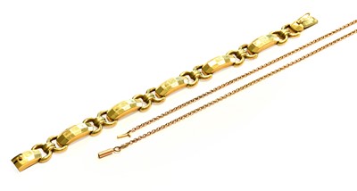 Lot 169 - A fancy link bracelet, clasp stamped '585',...