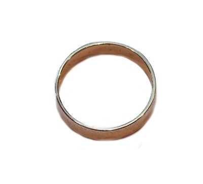 Lot 217 - A platinum band ring, finger size M