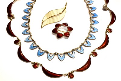 Lot 152 - A blue enamel necklace, length 38.5cm; a red...