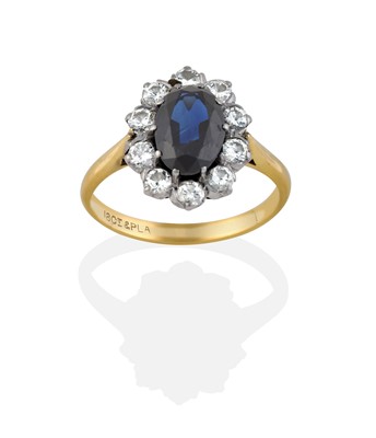 Lot 2316 - A Sapphire and Diamond Cluster Ring