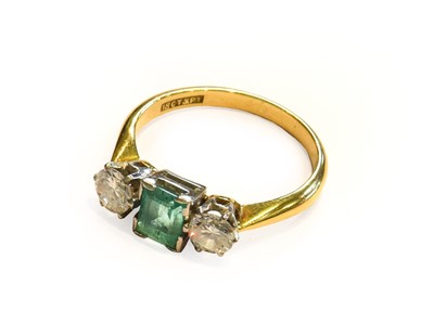 Lot 161 - An emerald and diamond three stone ring,...