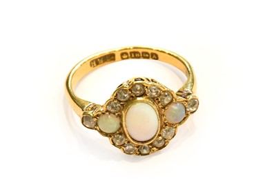 Lot 179 - An 18 carat gold opal and diamond cluster ring,...