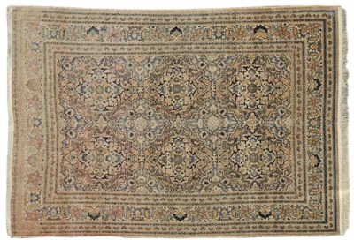 Lot 1083 - Tabriz Rug Persian Azerbaijan The soft ivory field with columns of flowerhead medallions...