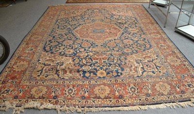 Lot 1084 - Tabriz Carpet Persian Azerbaijan The deep indigo field of scrolling leafy vines around a terracotta